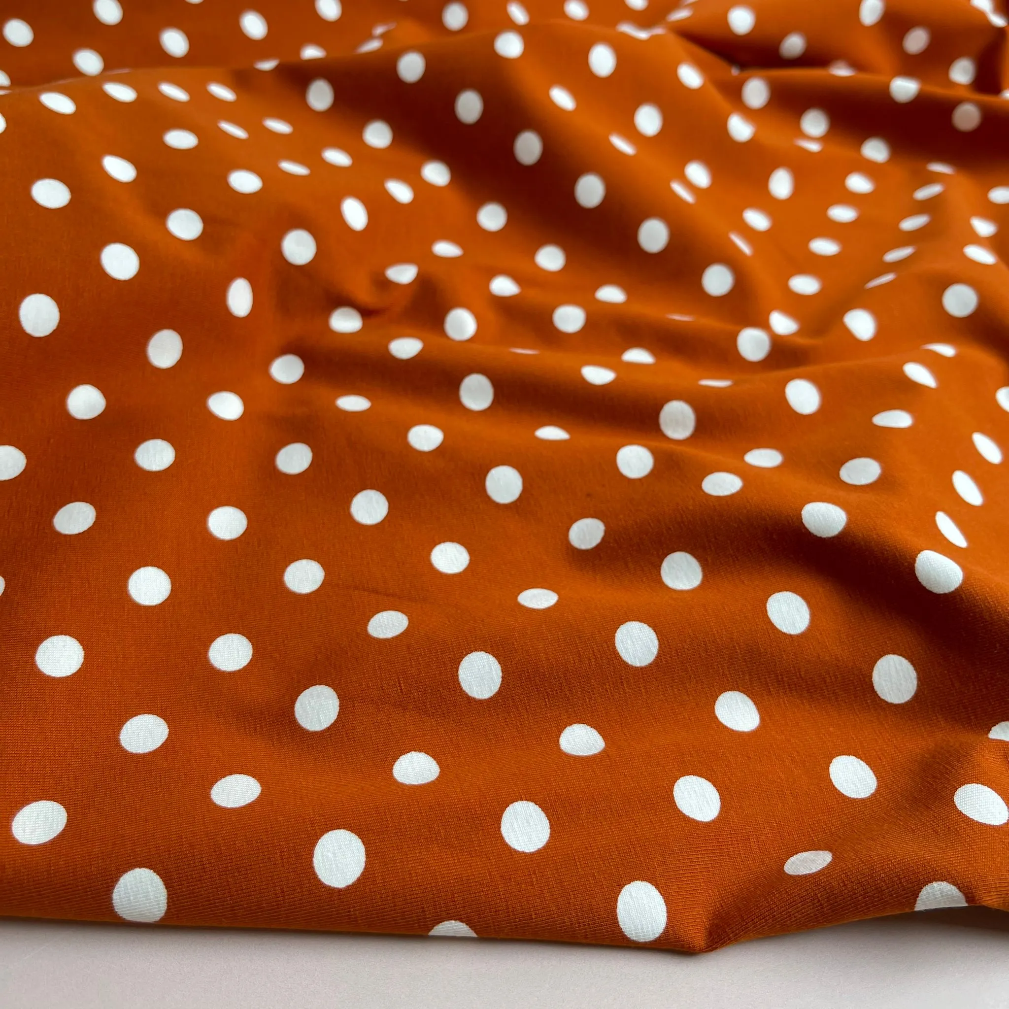 Danish Design - Polka Dots on Rust Cotton Jersey Fabric